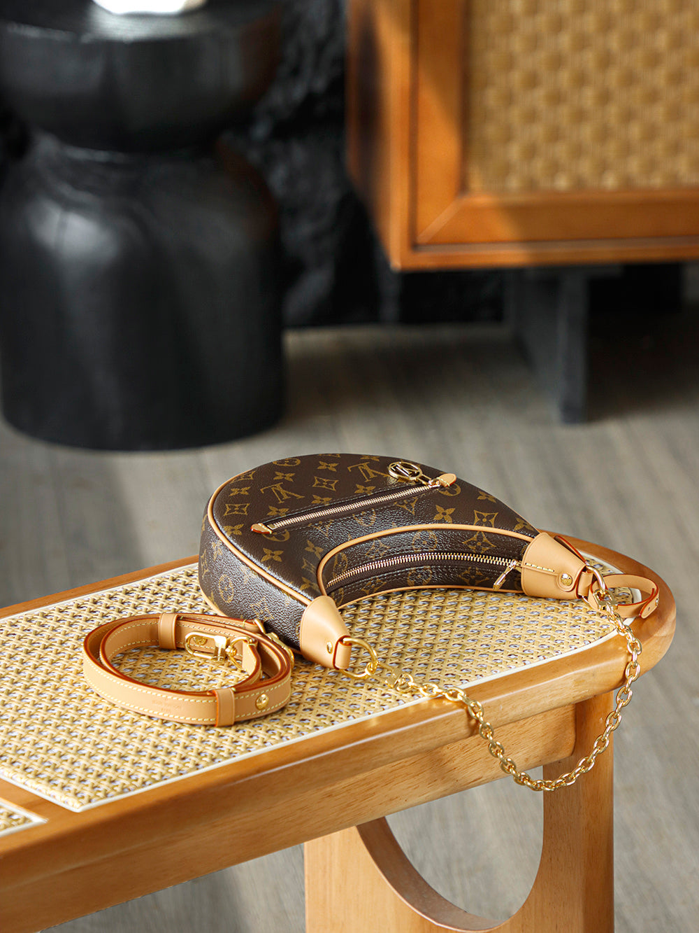 Used LV luxury handbag versatile for commuting, dirt resistant, crescent shaped silhouette design