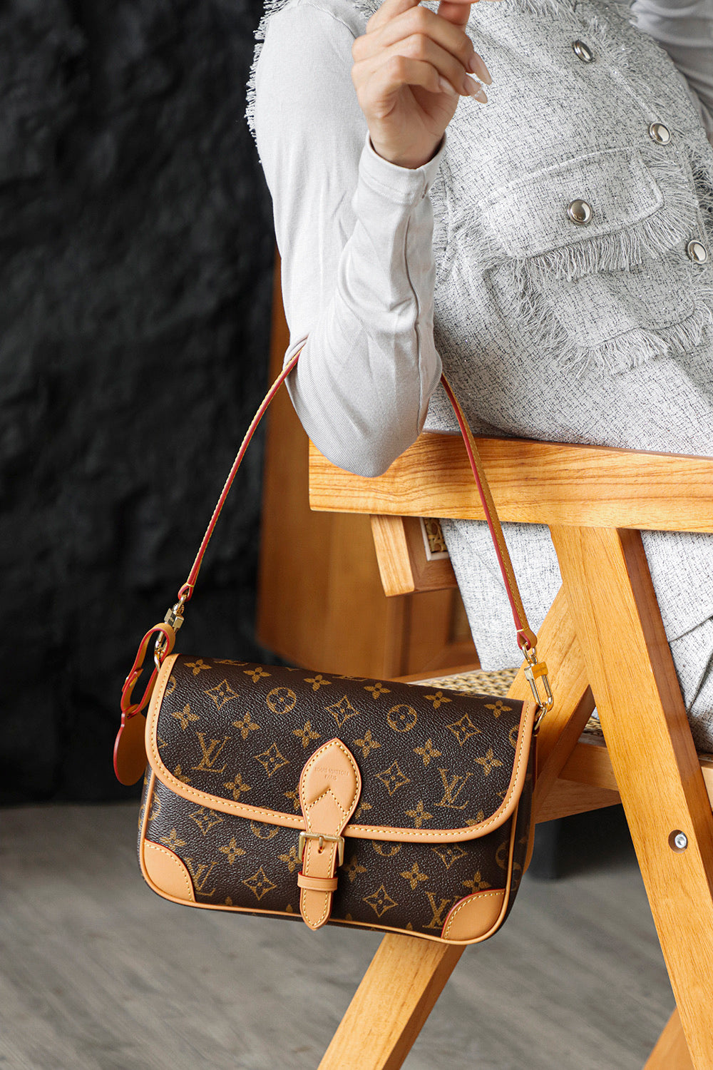 Second hand Louis Vuitton luxury bag with baguette bag featuring a simple yet unique jacquard wide shoulder strap design
