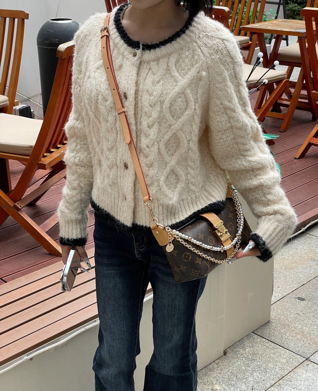 Second hand luxury LV bag, simple, classic, vintage, versatile and trendy, out on the street